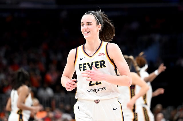WASHINGTON, DC - JUNE 07: Caitlin Clark #22 of the Indiana Fever celebrates during the game against the Washington Mystics at Capital One Arena on June 07, 2024 in Washington, DC. NOTE TO USER: User expressly acknowledges and agrees that, by downloading and or using this photograph, User is consenting to the terms and conditions of the Getty Images License Agreement.