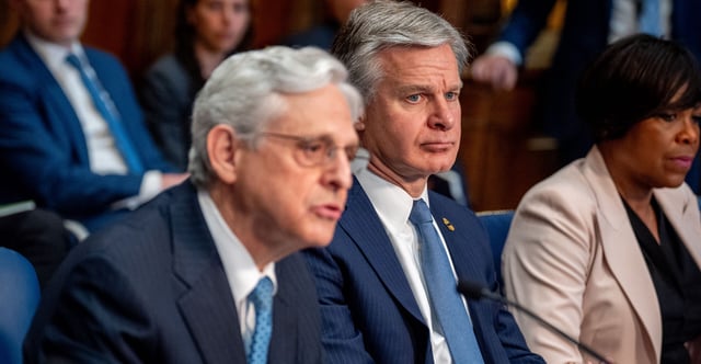 A newly released complaint to the Justice Department's inspector general claims that the FBI questioned colleagues about an employee's support for Donald Trump and his plans to attend the Jan. 6, 2021, protest at the Capitol. Pictured: Attorney General Merrick Garland, accompanied by FBI Director Christopher Wray, speaks at an meeting at the Justice Department on May 13, 2024 in Washington, D.C. (Photo: Andrew Harnik/Getty Images)