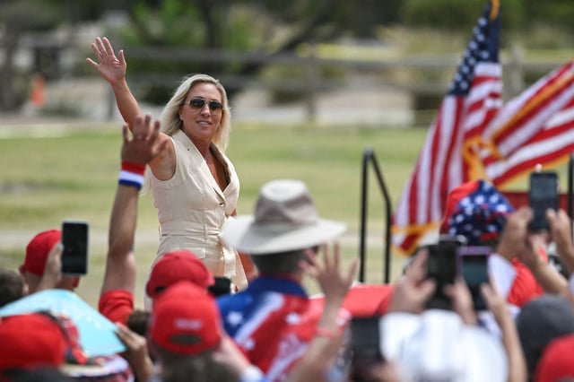 US Representative Marjorie Taylor-Greene, Republican of Georgia, arrives to speak during a campaign rally for former US President and Republican presidential candidate Donald Trump at Sunset Park in Las Vegas, Nevada on June 9, 2024. Thousands of Donald Trump supporters rallied in baking heat Sunday to cheer on the Republican presidential candidate in Nevada, a key battleground state for the US election in November. (Photo by Jim WATSON / AFP) (Photo by JIM WATSON/AFP via Getty Images)