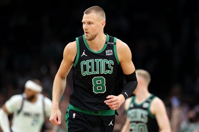 Boston Celtics center Kristaps Porzingis reacts after a play against the Dallas Mavericks during Game 2 of the 2024 NBA Finals.