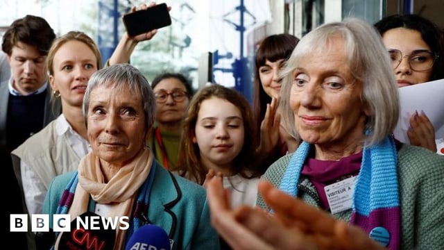 Anne Mahrer and Rosmarie Wydler-Walti, of the Swiss elderly women group Senior Women for Climate Protection, talk to journalists after a historic ruling in their favour by the European Court of Human Rights in Strasbourg, France.