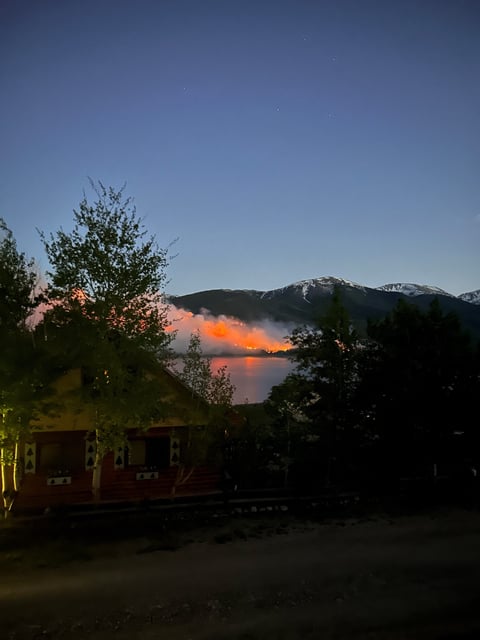 A wildfire burns on the south side of Twin Lakes in Colorado, U.S. June 11, 2024 in this picture obtained from social media.