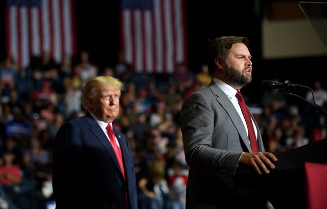 In this September 2022 photo, J.D. Vance and former President Donald Trump speak at a Save America Rally in Youngstown, Ohio.