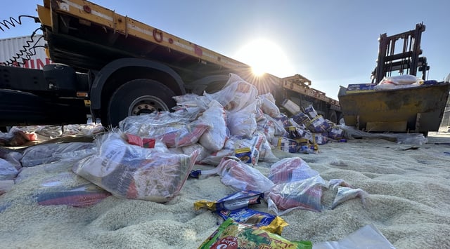 TARQUMIYAH, WEST BANK - MAY 13: Humanitarian aid supplies dumvped by Jewish settlers to road near Tarqumiyah military checkpoint in Hebron, West Bank on May 13, 2024. Jewish settlers stopped the trucks en route to Gaza Strip to help Palestinians in need, and dumped the supplies on the road. (Photo by Ibrahim Hamad/Anadolu via Getty Images)