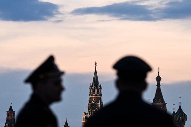 Russian servicemen outside the Kremline in central Moscow on April 27, 2023.