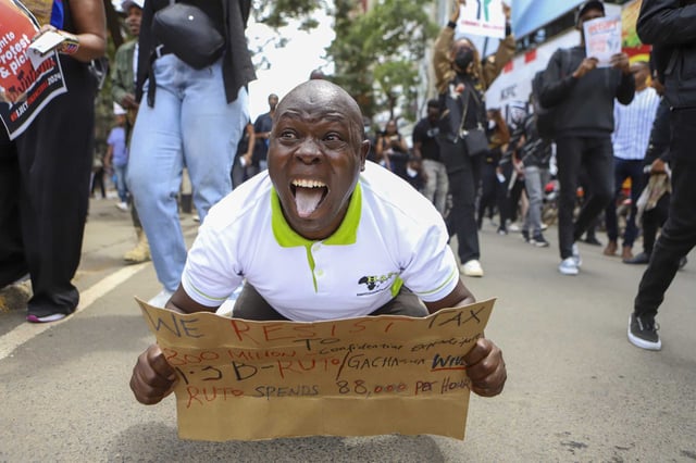 Demonstrators protest against proposed tax hikes in a finance bill that is due to be tabled in parliament in Nairobi, Kenya, Tuesday, June 18, 2024. Civil society groups say that despite the dozens of arrests, demonstrations and a planned sit-down outside the parliament buildings will continue.