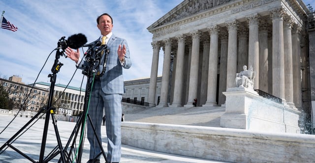 Louisiana Gov. Jeff Landry—seen here March 18 outside the Supreme Court speaking with reporters after justices heard oral arguments in a First Amendment case—on Wednesday signed an expansive Educational Savings Accounts bill into law. (Photo: Jabin Botsford/The Washington Post/Getty Images)