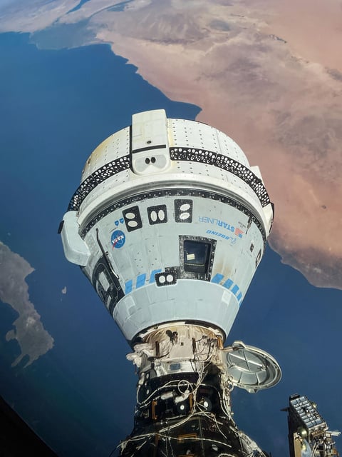 The Starliner spacecraft on NASA's Boeing Crew Flight Test is pictured docked to the Harmony module's forward port as the International Space Station orbited 263 miles above the Mediterranean Sea. Credit: NASA