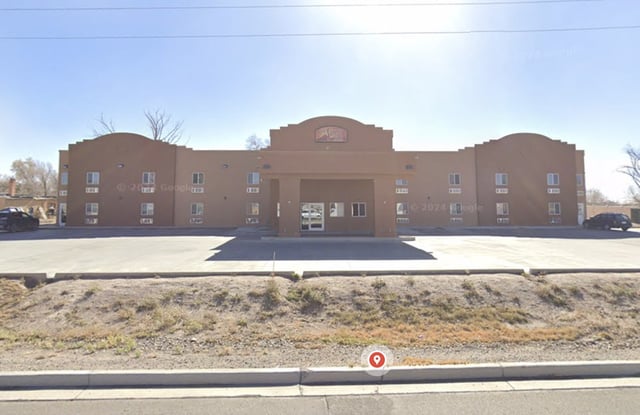 Police arrested a man accused of killing one person and wounding two others Sunday at the Sunset Inn hotel in Alamosa, Colorado.
