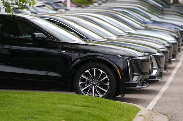 Vehicles sit in a row outside a dealership, June 2, 2024, in Lone Tree, Colo. Car dealerships across North America have faced a major disruption this week. CDK Global, a company that provides software for thousands of auto dealers in the U.S. and Canada, was hit by back-to-back cyberattacks on Wednesday, June 19, 2024. (AP Photo/David Zalubowski, File)