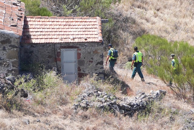 A search-and-rescue team looks for Slater near where he was last seen in Tenerife.