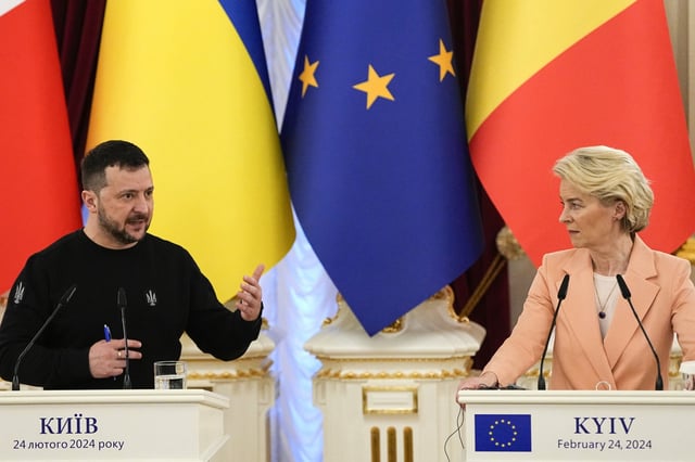 Ukrainian President Volodymyr Zelenskyy, left, speaks during a joint press conference with EU Commission President Ursula von der Leyen at Mariinsky Palace in Kyiv, Ukraine, Saturday, Feb. 24, 2024. The European Union agreed Friday, June 21, 2024, to start membership negotiations with embattled Ukraine and Moldova, another step in the nations' long journey to move closer to the West and mute Russia's influence. (AP Photo/Efrem Lukatsky, File)