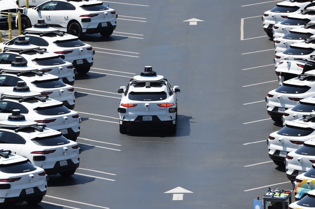A self-driving Waymo car drives out of the Waymo depot lot in Bayview, in San Francisco on Wednesday, July 19, 2023. In July of 2023, the San Francisco Municipal Transportation Agency urged the state to collect more data before allowing companies to expand the fleet of autonomous vehicles in the city.