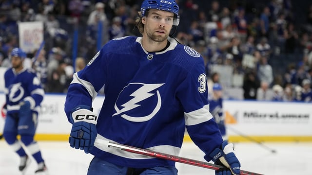 FILE - Tampa Bay Lightning left wing Brandon Hagel (38) skates before an NHL hockey game against the New York Islanders Saturday, April 1, 2023, in Tampa, Fla. The Tampa Bay Lightning have signed forward Brandon Hagel, Tuesday, Aug. 22, to an eight-year extension worth $52 million. (AP Photo/Chris O'Meara, File)