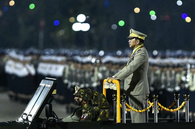 Myanmar's junta chief military Min Aung Hlaing arrives to deliver a speech during a ceremony to mark the country's Armed Forces Day in Naypyidaw on March 27, 2024. Myanmar's junta chief on March 27, 2024 blamed the country's growing armed resistance movement for preventing long-promised elections in a speech to thousands of soldiers following an Armed Forces Day parade. (Photo by AFP)