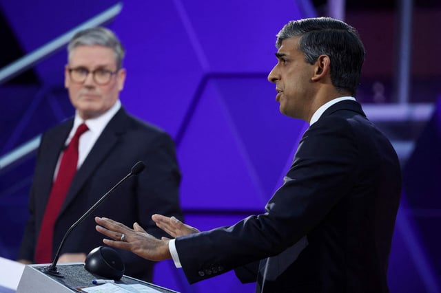 Britain's Prime Minister Rishi Sunak and opposition Labour Party leader Keir Starmer, left, take part for the BBC's Prime Ministerial Debate, in Nottingham, England, Wednesday June 26, 2024. (Phil Noble/Pool via AP) Contributor: Associated Press / Alamy Stock Photo