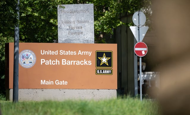 01 July 2020, Baden-Wuerttemberg, Stuttgart: A sign indicates the entrance to the Patch Barracks of the United States Army and the headquarters of the US forces in Europe. US President Trump agreed to a proposal for the partial withdrawal of US forces from Germany. According to the proposal, 9500 of the current 34 500 soldiers are to leave Germany.