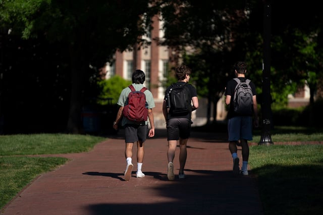 CHAPEL HILL, NORTH CAROLINA - MAY 1: Students  walk on campus at the University of North Carolina on May 1, 2024 in Chapel Hill, North Carolina. The University of North Carolina was the first public university to accept and graduate students in the United States. (Photo by Sean Rayford/Getty Images)