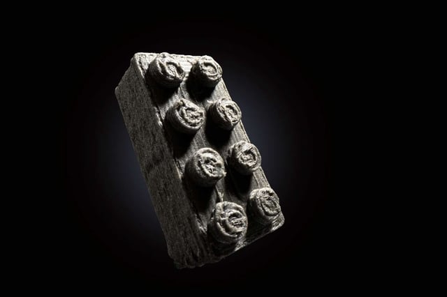 LEGO's European Space Agency collaboration created a Space Brick, made from meteorite dust and other materials. The material could one-day build infrastructure on the Moon and beyond. Credit: LEGO