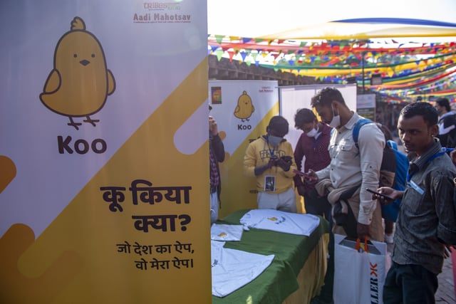 People download the Koo app at their promotional stall inKoo is a personal update, opinion-sharing micro-blogging platform. The made-in-India app empowers people to express their thoughts in Indian languages with a strong-knit local Indian community. With ten million downloads, its the fastest-growing Indian social networking App owned by Bombinate Technologies Pvt Ltd., a Bangalore-based company. Koo has been declared an AatmaNirbhar (self-dependent) app and won the AatmaNirbhar (self-dependent) App Innovation Challenge held by the Government of India in August 2020. PM Narendra Modi encourages Indians to use the Koo App in his Mann Ki Baat speech too. (Photo by Pradeep Gaur/SOPA Images/LightRocket via Getty Images)