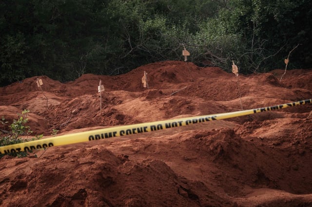 A mass-grave site is seen in Shakahola, outside the coastal town of Malindi, Kenya The leader of a Kenyan doomsday cult went on trial on Monday on charges of terrorism over the deaths of more than 400 of his followers. Photo: AFP