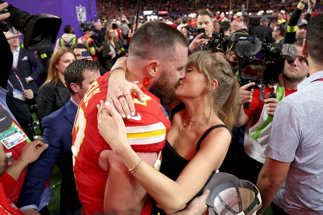 LAS VEGAS, NEVADA - FEBRUARY 11: Travis Kelce #87 of the Kansas City Chiefs and Taylor Swift embrace after defeating the San Francisco 49ers in overtime during Super Bowl LVIII at Allegiant Stadium on February 11, 2024 in Las Vegas, Nevada. (Photo by Ezra Shaw/Getty Images)