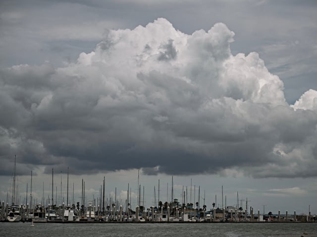 Boats sit in a marina ahead of the arrival of Tropical Storm Beryl in Corpus Christi, Texas on July 7, 2024. Beryl weakened to a tropical storm on July 5 after hitting Mexico as a Category 2 hurricane, with fierce winds causing material damage but no injuries along the touristic Yucatan Peninsula. Now headed for the Gulf of Mexico, Beryl is expected to intensify as it moves toward northeastern Mexico and the US state of Texas by the end of the weekend, according to the Miami-based National Hurricane Center (NHC). (Photo by Mark Felix / AFP)