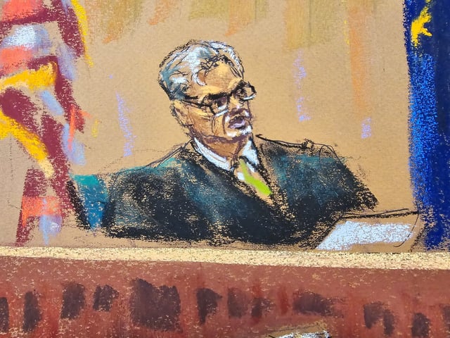 New York Judge Juan Merchan looks on as Republican presidential candidate and former President Donald Trump attends his criminal trial over charges that he falsified business records to conceal money paid to silence porn star Stormy Daniels in 2016, at Manhattan state court in New York City, on May 30, 2024 in this courtroom sketch.