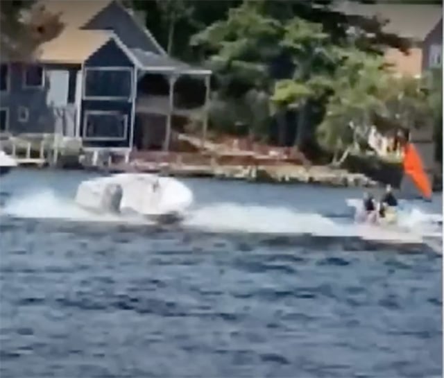 A boat was zooming uncontrolled around Lake Winnipesaukee in New Hampshire after the driver was knocked out of the boat unexpectedly.