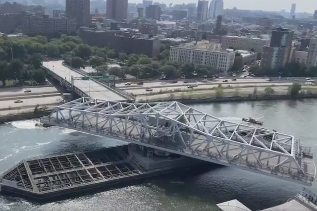 Aerial footage shows the Third Avenue Bridge stuck on Monday afternoon.