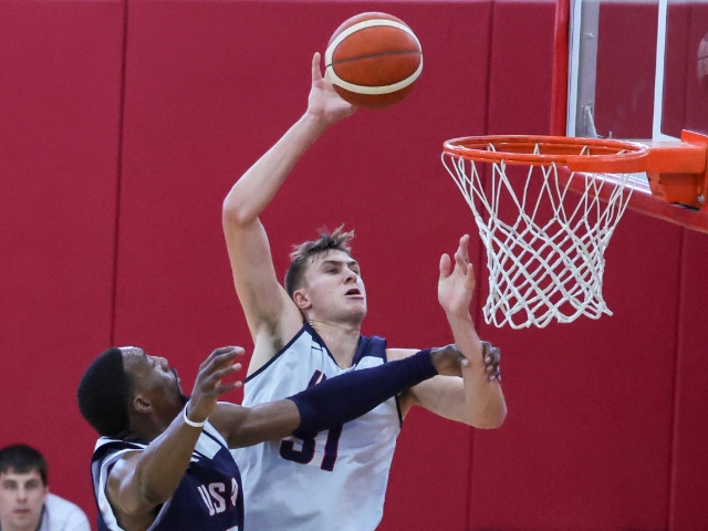 LAS VEGAS, NEVADA - JULY 08: Cooper Flagg #31 of the 2024 USA Basketball Men's Select Team scores a basket after being fouled by Bam Adebayo #13 of the 2024 USA Basketball Men's National Team during a practice session scrimmage at the team's training camp at the Mendenhall Center at UNLV on July 08, 2024 in Las Vegas, Nevada. (Photo by Ethan Miller/Getty Images)