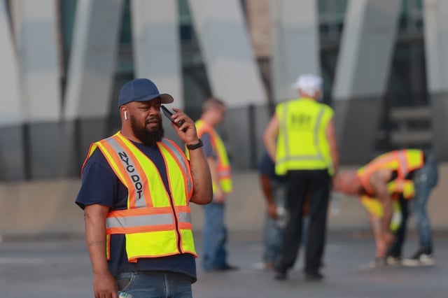 City Transportation Department workers service the Third Avenue Bridge after it was stuck in the open position on Monday afternoon.