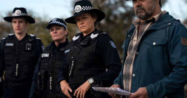 Leah Purcell as Andie Whitford and Aaron Pedersen as Owen Cooper in High Country, stood with two other police officers