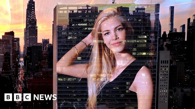 Kat Torres' picture projected onto a stylised backdrop of the New York skyline