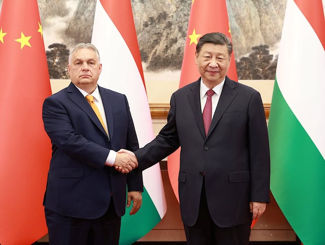 China’s President Xi Jinping, right, and Hungary’s Prime Minister Viktor Orban in Beijing, China on July 8. Photo: China Daily via Reuters