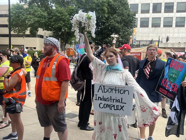 Progressive Anti-Abortion Uprising, an anti-abortion group, demonstrates in Red Arrow Park.