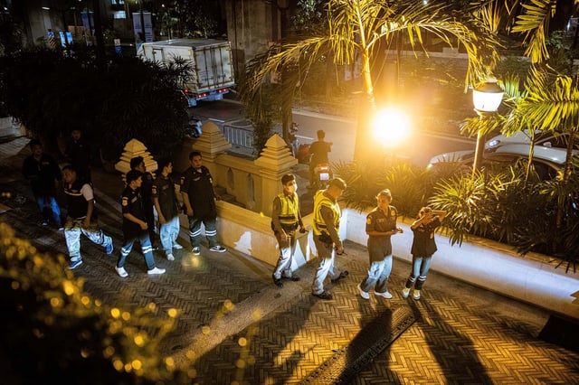Authorities at the Grand Hyatt hotel on Tuesday.