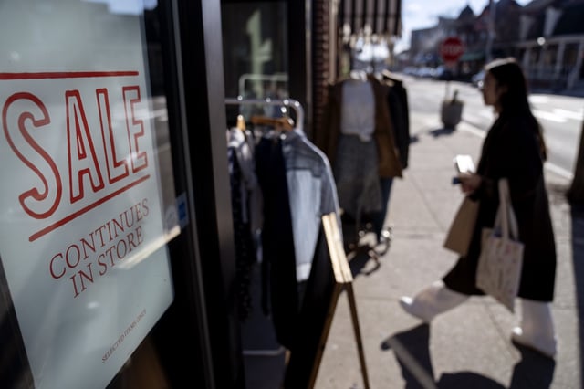 A shop holds a sidewalk sale on Feb. 10, 2023, in Providence, R.I. Small business sales growth slowed in June, 2024, as consumers took a pause on spending. (AP Photo/David Goldman, File)