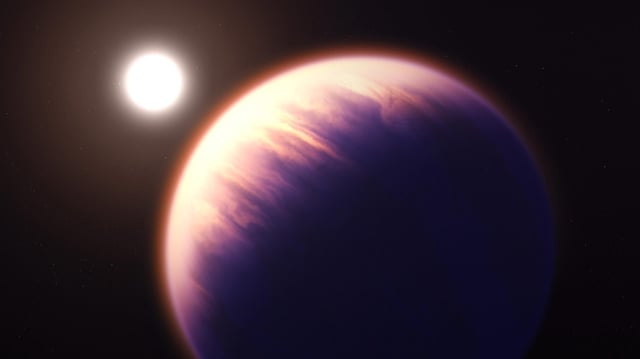 This illustration shows what exoplanet WASP-39 b could look like, based on current understanding of the planet. WASP-39 b is a hot, puffy gas giant with a mass 0.28 times Jupiter (0.94 times Saturn) and a diameter 1.3 times greater than Jupiter, orbiting just 0.0486 astronomical units (4,500,000 miles) from its star. The star, WASP-39, is fractionally smaller and less massive than the Sun. Because it is so close to its star, WASP-39 b is very hot and is likely to be tidally locked, with one side facing the star at all times. NASA’s James Webb Space Telescope’s exquisitely sensitive instruments have provided a profile of WASP-39 b’s atmospheric constituents and identified a plethora of contents, including water, sulfur dioxide, carbon monoxide, sodium and potassium. This illustration is based on indirect transit observations from Webb as well as other space- and ground-based telescopes. Webb has not captured a direct image of this planet. Credit: NASA, ESA, CSA, Joseph Olmsted (STScI)