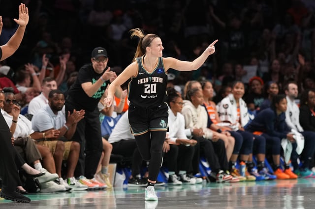 BROOKLYN, NY - JULY 16: Sabrina Ionescu #20 of the New York Liberty celebrates during the game against the Connecticut Sun on July 16, 2024 in Brooklyn, New York. NOTE TO USER: User expressly acknowledges and agrees that, by downloading and or using this photograph, user is consenting to the terms and conditions of the Getty Images License Agreement. Mandatory Copyright Notice: Copyright 2024 NBAE (Photo by Evan Yu/NBAE via Getty Images)