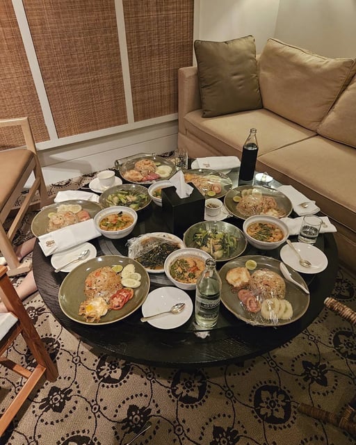 In this photo released by the Royal Thai Police, uneaten meals are left on a table in a room in the Grand Hyatt Erawan Hotel room where six people were found dead. 