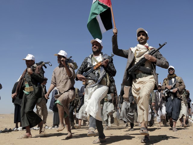 Houthi fighters march during a rally of support for the Palestinians in the Gaza Strip and against the U.S. strikes on Yemen outside Sanaa on Jan. 22, 2024. The U.S. and Britain have struck more than a dozen Houthi targets in Yemen. The strikes on Saturday, Feb. 24, answer a recent surge in attacks by the Iran-backed militia group on ships in the Red Sea and Gulf of Aden. (AP Photo, File)