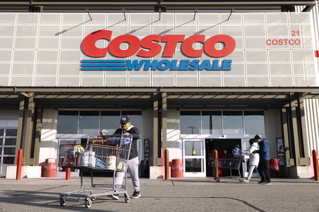Shoppers outside a Costco store in Bayonne, N.J., on Dec. 9, 2023. 