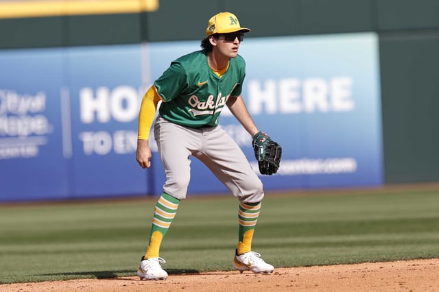 GOODYEAR, AZ - FEBRUARY 27: Jacob Wilson #83 of the Oakland Athletics fields during a spring training game against the Cleveland Guardians at Goodyear Ballpark on February 27, 2024 in Mesa, Arizona.