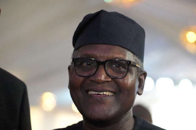 Aliko Dangote, Africa's wealthiest man, smiles during the opening ceremony of Africa's biggest oil refinery in Lagos, Nigeria, Monday, May 22, 2023. Nigerian legislators on Monday, July 22, 2024, began a probe into the allegations of the importation of contaminated fuel into the country, as part of moves to resolve wider issues causing a rift between an oil refinery owned by Dangote and the industry regulator. (AP Photo/Sunday Alamba, File)