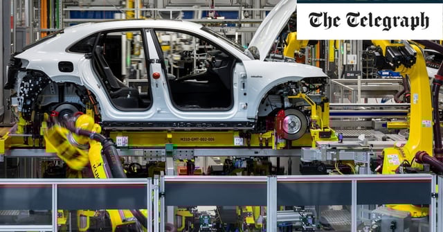 An electric Porsche Macan on the production line in Leipzig. German car makers have been exposed to a slowdown in exports to China