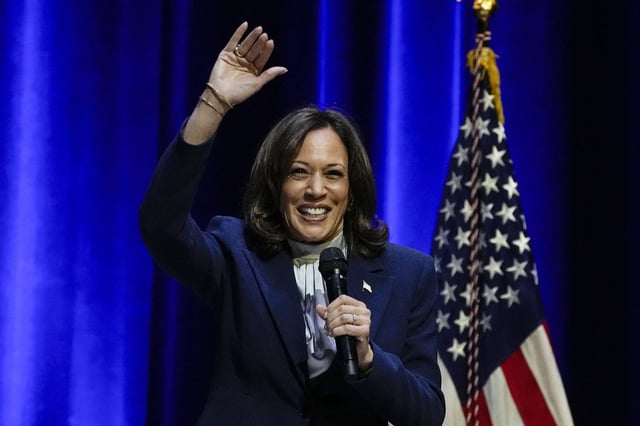 Vice President Kamala Harris waves