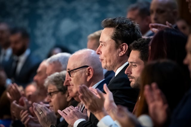 Elon Musk and other guests applaud Israeli Prime Minister Benjamin Netanyahu during his controversial address to a joint session of Congress on July 24, 2024. 