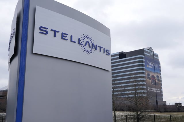 The Stellantis sign is seen outside the Chrysler Technology Center, July 19, 2021, in Auburn Hills, Mich. Jeep and Ram maker Stellantis says it will offer buyout packages to many of its U.S. white-collar workers just five days after the company's CEO said the auto industry is in the middle of a significant storm. (AP Photo/Carlos Osorio, File)