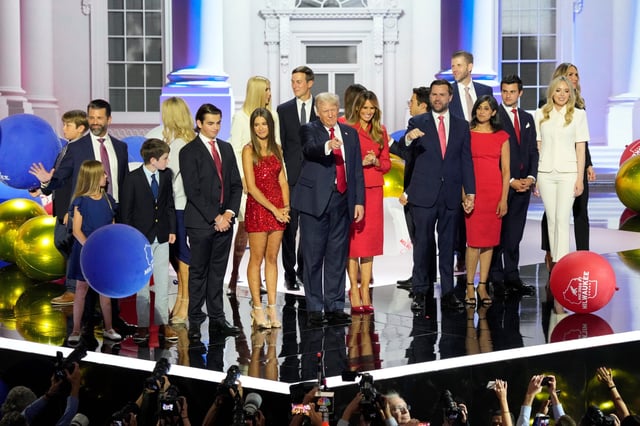 Republican presidential nominee Donald Trump and his family, along with vice presidential nominee JD Vance and his wife, celebrate on the final day of the Republican National Convention in Milwaukee on July 18, 2024.